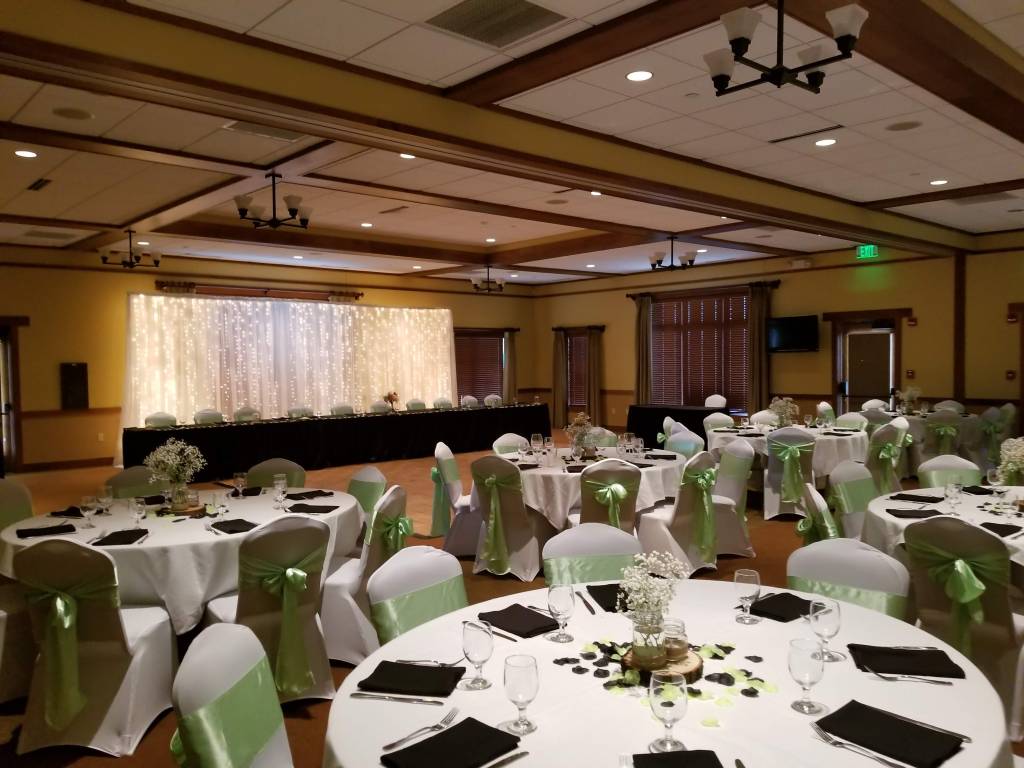 Banquet seating with white and light green decorations